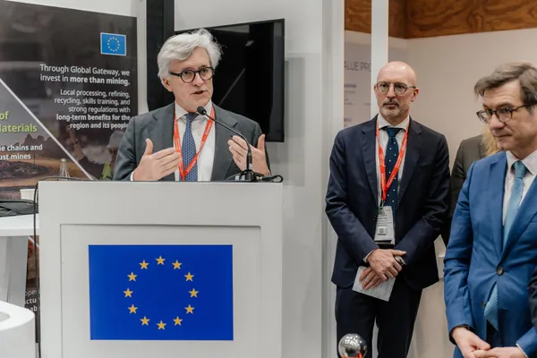 A speaker at the European Union lectern addressing delegates