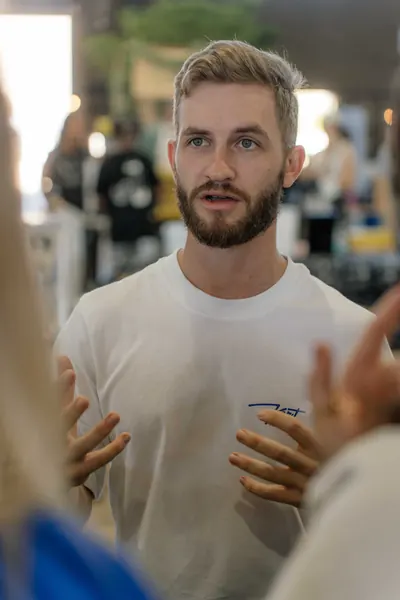 The barista chatting to customers across the counter, Kort Coffee