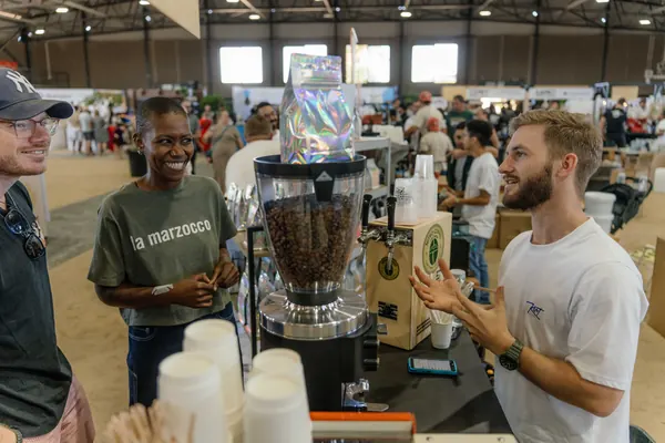 Customers watching the coffee being ground, Kort Coffee