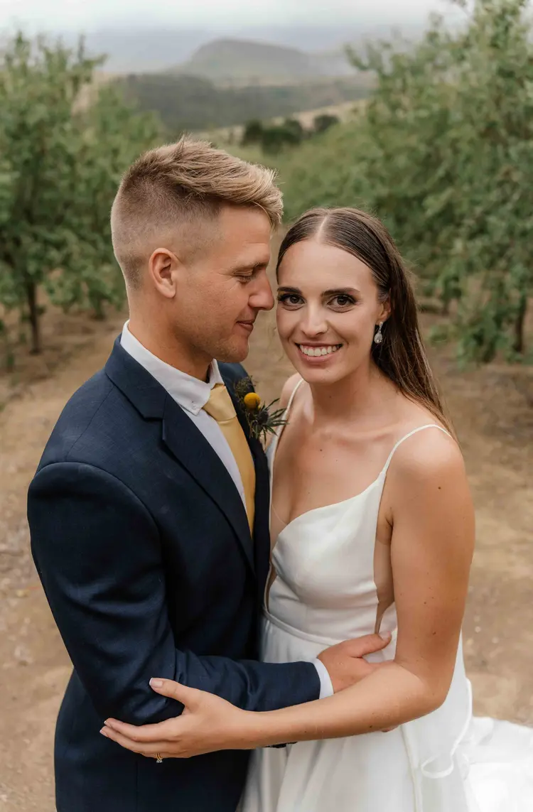 Couple together in an olive grove